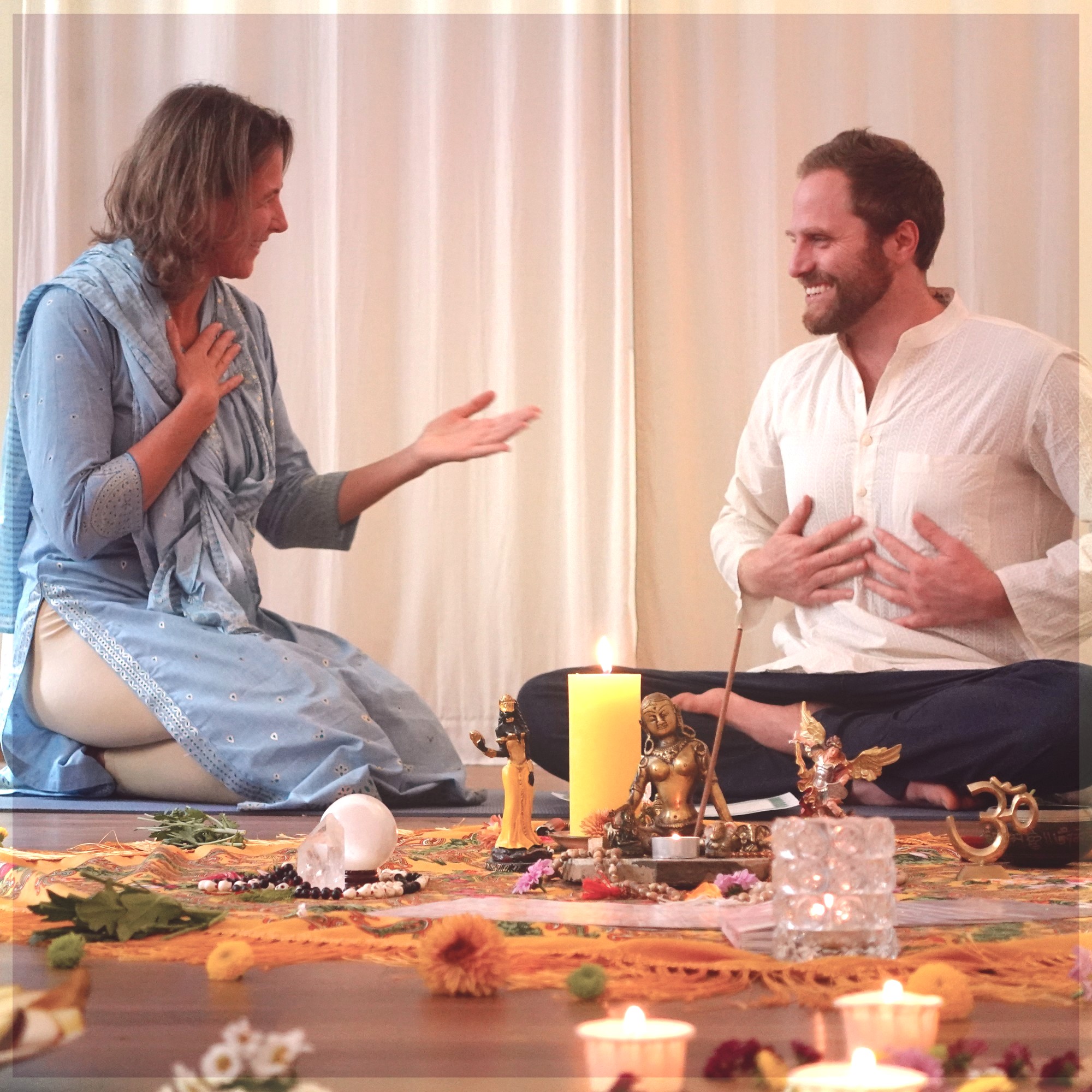 Kundalini yoga ceremony Meditation session with candles and decor.